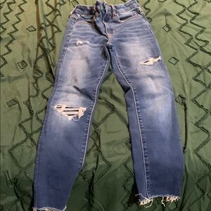 Distressed Blue Denim Jeans